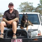 Jamie with dog on bonnet of car